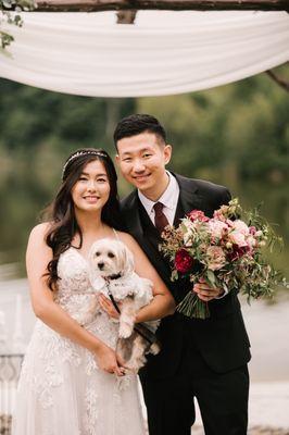 Groom and bride with dog