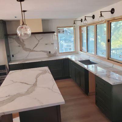 Porcelain kitchen countertop with full backsplash.