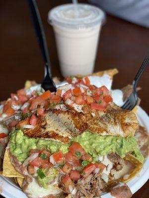 Our regular Nacho $9.50 add fish and carnitas Total $21 with Horchata