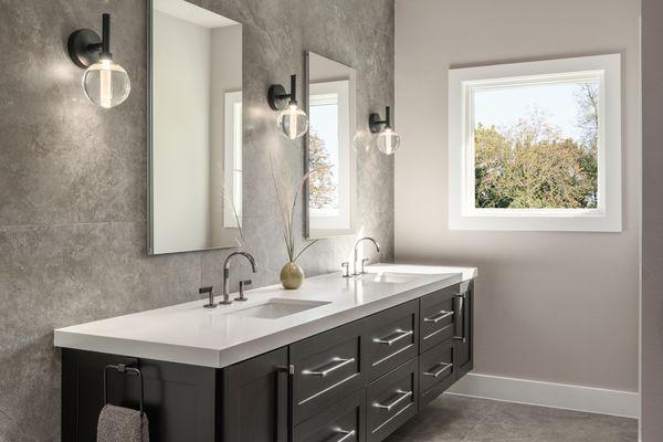 Complete Primary bathroom remodel. Custom vanity, tile wall covering, and tile flooring, custom window, fixtures/lighting.