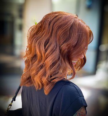 Cowboy copper and a long layered medium length haircut