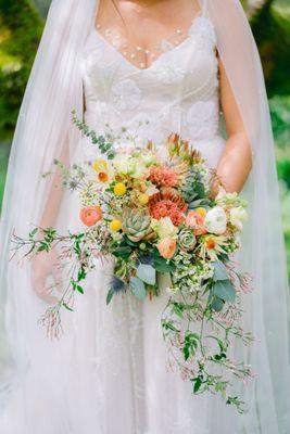 wedding bouquet with protea and succulents