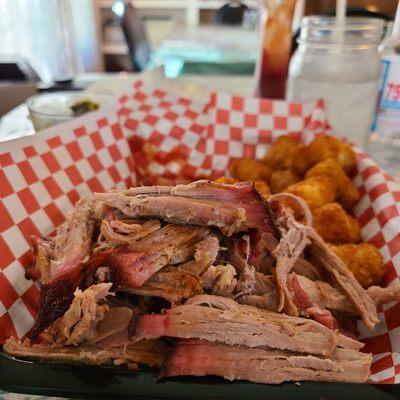 Very generous lunch portion of pulled pork, tater tots, and greens (devoured before picture).