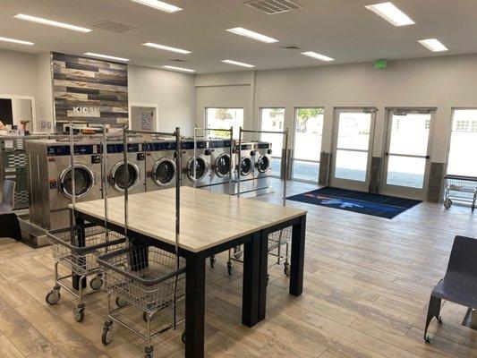 Tables and carts, open clean laundromat