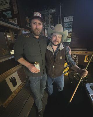 Dusty Rust and band mates playing pool and enjoying beers