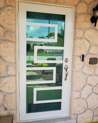 Single French door with one of our custom designs! (White frame / impact clear glass with low-e) #floridaimpactwindowsanddoors #category5