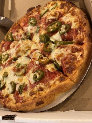 Pepperoni and jalapeño pizza