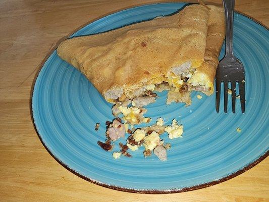 Breakfast crepe. Had to take a picture fast he was devouring it