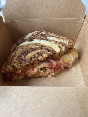 Connor's Reuben - 1/2 in a to-go box. It was absolutely delicious and huge. Loved it.