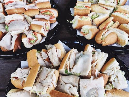 Party trays... Large hoagies cut into 1/4's. Italian, turkey, veggie and mixed cheese.