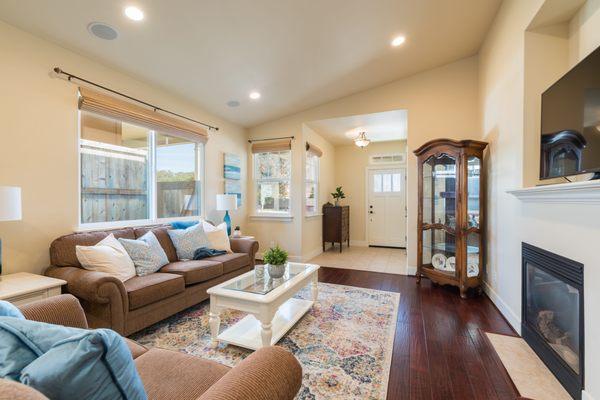 Hardwood flooring and lots of natural light in this living room!