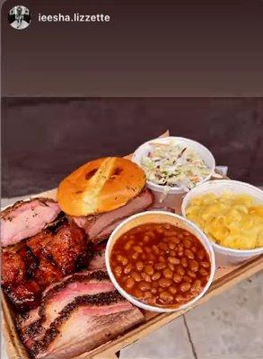 Tri-tip, pork belly burnt ends, brisket, baked beans, coleslaw, macaroni and cheese, and brisket sandwich