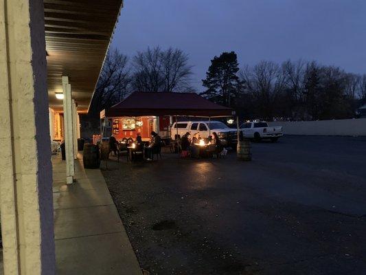 Outdoor seating, 4 fire pit tables with a polish food truck today.