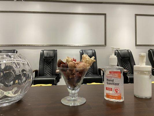 The drying station with potpourri, hand sanitizer, lotion, and tip jar