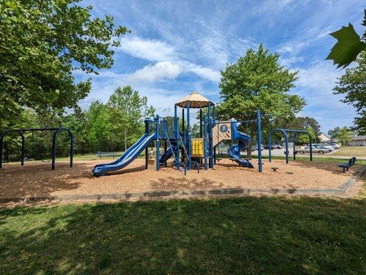 This is one of several views of the original playground before replacement.  Photo taken April 22, 2023.