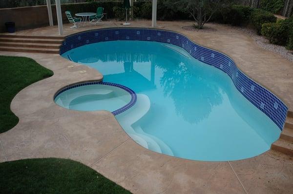 Pool Remodel, new plaster, tile and colored concrete pool deck