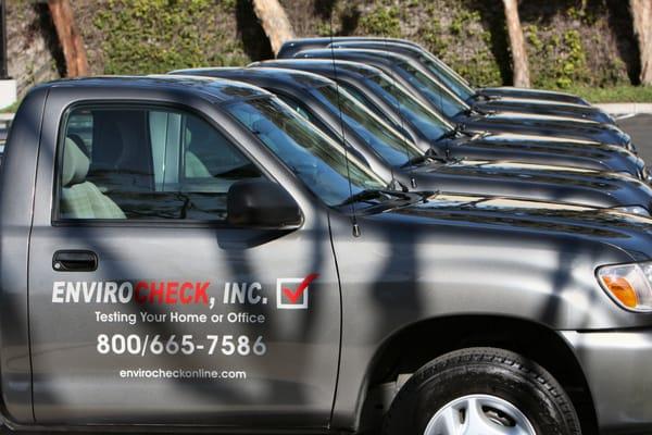 Team ENVIROCHECK's fleet of trucks, ready to head out to the job site and collect samples for the lab.