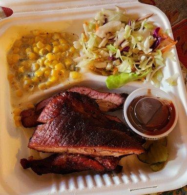 Smoked rib plate dinner. Green chile corn is SPICY!! Apple slaw is okay. BBQ sauce is sweet fire!