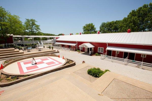 The Visitor Center features educational exhibits, unique pet-centric entertainment and fun activities including wagon rides and a hayloft.