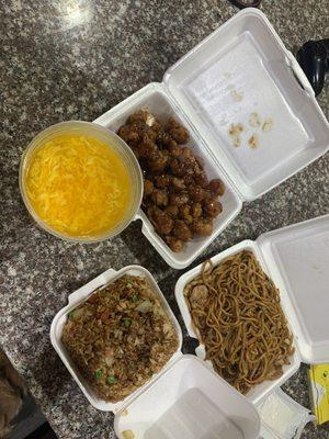 Egg drop soup, orange chicken, fried rice, house special lo mein. NOT pictured: Krab rangoons.