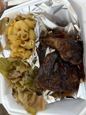 Jerk chicken. Mac and cheese. Cabbage.