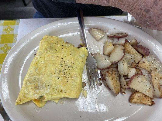 Western omelette served with potatoes. Out of this world good. Also included all the coffee we could drink