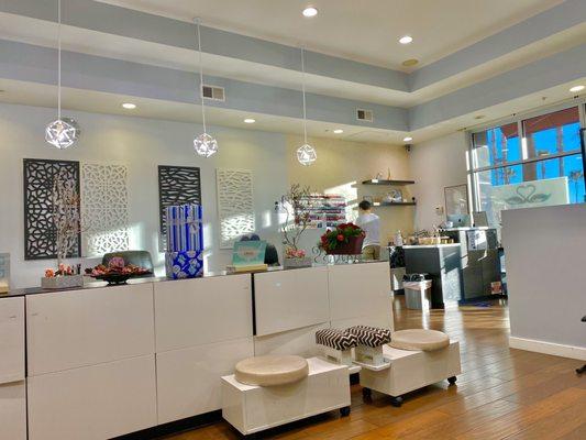 A very modern, well decorated, and clean nail salon