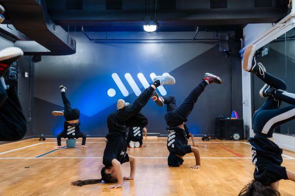 Youth learning to Break Dance in Washington DC and Virginia