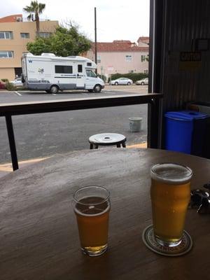 We can see our dogs in the Moho while enjoying a beer