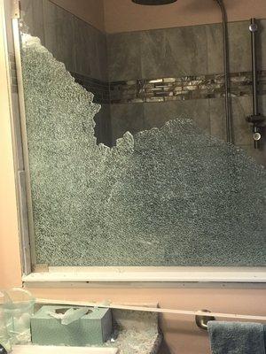 Walk in shower glass shattered