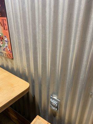 Place to charge your phone in booths