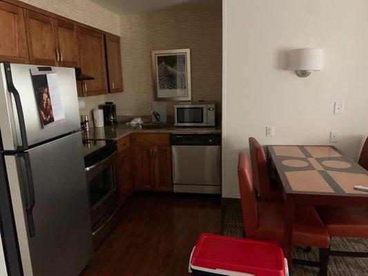 Kitchen/dining area: full size fridge, stove and over, microwave, etc