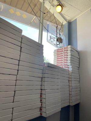 Stacked pizza boxes