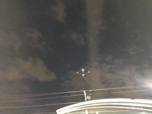 Airplane passing above the Shell/McDonald's