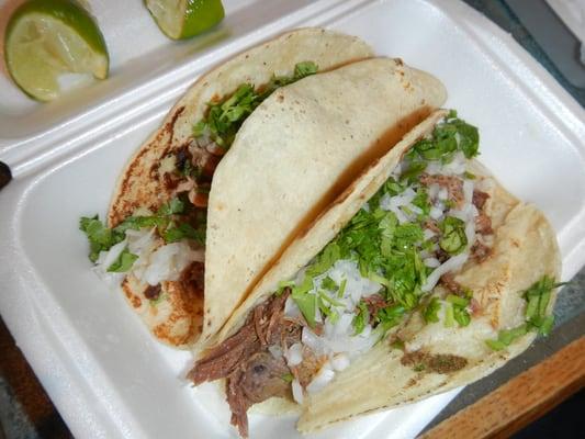 Two tacos barbacoa (take out.) The meat's a little bit bland but still pretty decent.