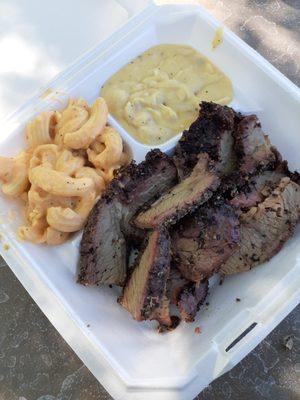 Brisket plate that includes loaded mashed potatoes and nacho mama's mac.