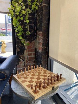 Chess board available for patrons to play.