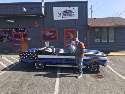 The owner Martin with my car after correcting the body work to get a wrap.