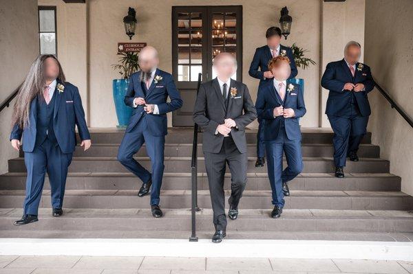 We went with the Mantoni Suit in Black for the Groom and Giorgio Fiorelli Suits in French Blue for the Groomsmen.