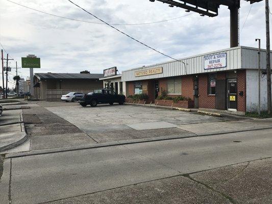 View of Moran's Boot & Shoe Repair from the Westbank Expressway, lower level.