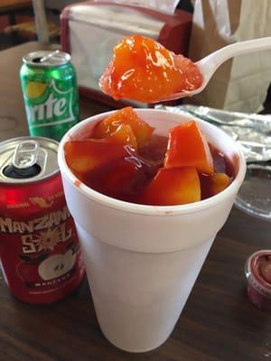 Mangonado. Snow cone w chopped mango & Mexican chamoy (chile condiment). Good stuff.