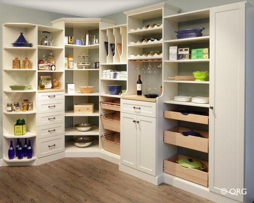 Pantry with space-saving storage for bakeware, glassware, roll-out trays, adjustable shelving, etc.