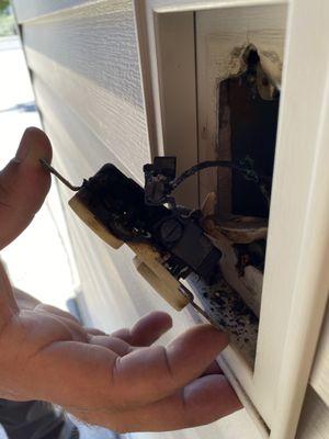 Electrician looking at damage