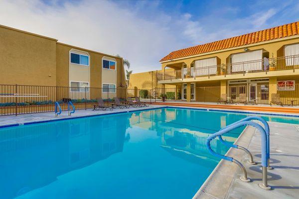 Swimming pool at Whiffle Tree Apartment Homes in Huntington Beach, CA.