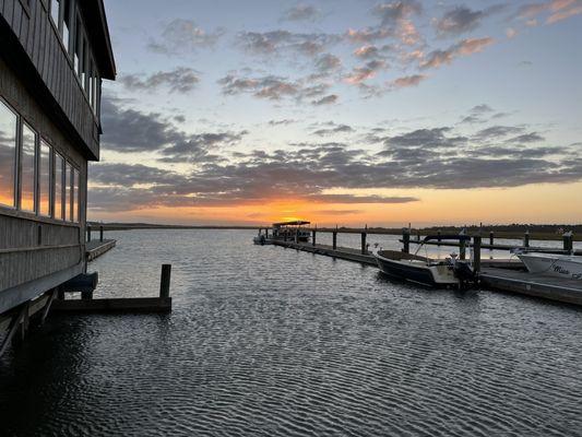 Sunset exterior Bonita Boathouse restaurant and docks