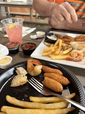 Steamer platter with hush puppies and French Fries