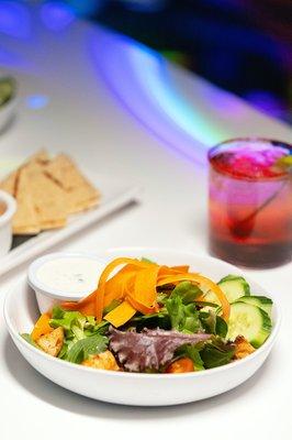 Our playhouse salad is one of the great healthy options of food that our Atomic Eats cafe offers.