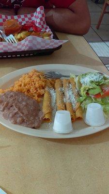 Beef flautas four in a plate. Rather small.