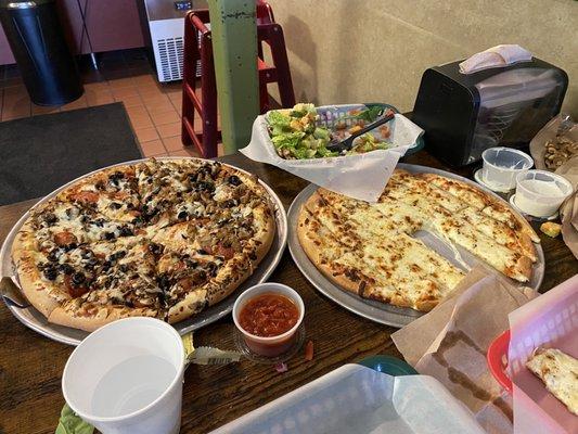 Classic pizza garlic cheesy bread salad and a giant cookie