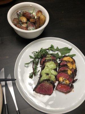 grilled Denver steak with choice of green herb butter or smoky Berbere butter